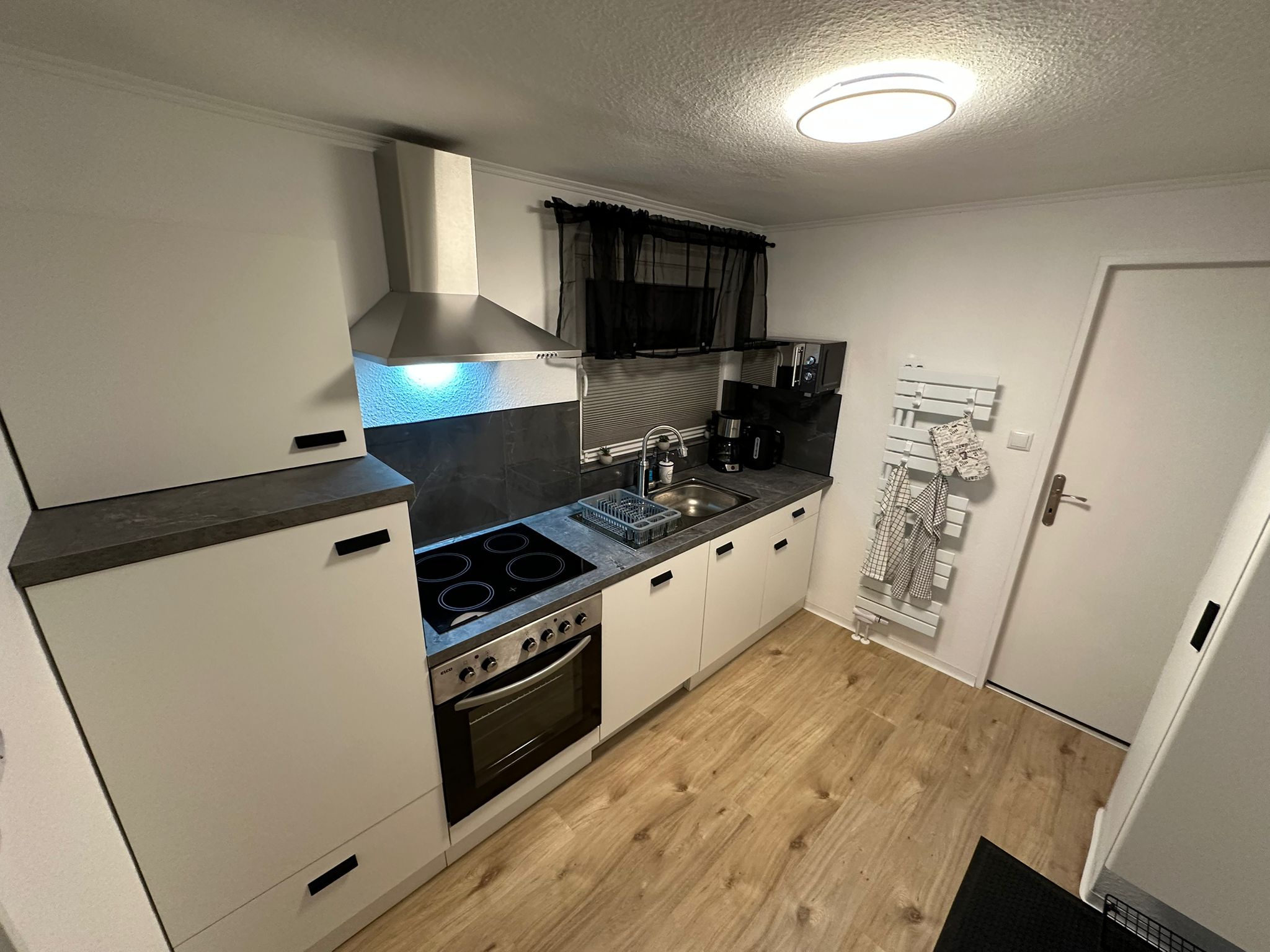 Küche und Eingangsbereich